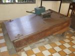 800px-waterboardwithcankhmerrouge A waterboarding table. The victim's head goes down so that they experience a sense of drowning.